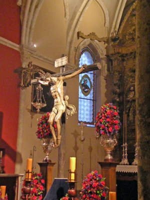 La comunidad de Alcalá del Río celebra misa en honor al Santísimo Cristo del Buen Fin.