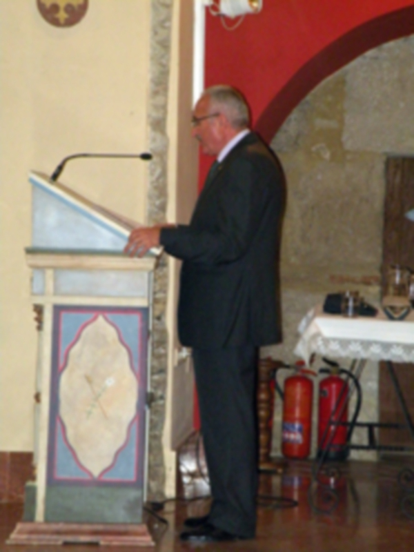 Provincia.El Profesor e Historiador D. Manuel Morales Morales, pronuncio una disertación, sobre el canto de la Sentencia de Pilatos en la Hermandad de Jesús Nazareno de Alcalá del Río.