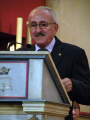 Provincia.El Profesor e Historiador D. Manuel Morales Morales, pronuncio una disertación, sobre el canto de la Sentencia de Pilatos en la Hermandad de Jesús Nazareno de Alcalá del Río.