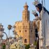 La Virgen del Carmen de Triana navega por el Guadalquivir en una jornada de profunda tradición marinera en Sevilla 